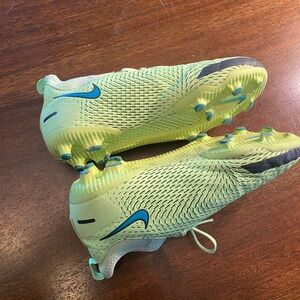 Nike Kids Soccer Cleats in Volt with Teal Swoosh